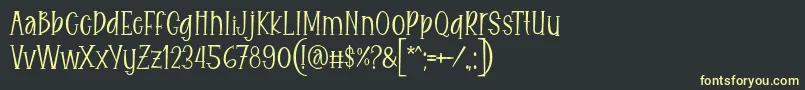 Czcionka Eitaro Font by 7NTypes – żółte czcionki na czarnym tle