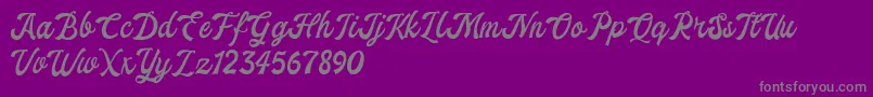 ekshada dafont-Schriftart – Graue Schriften auf violettem Hintergrund