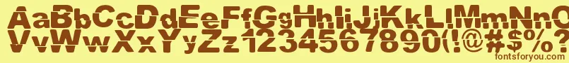 El ExtraРґo Font – Brown Fonts on Yellow Background