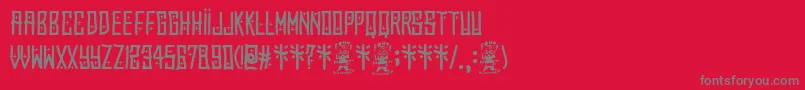 フォントEl Forastero – 赤い背景に灰色の文字