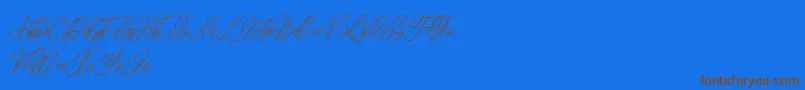 elaineighteen-Schriftart – Braune Schriften auf blauem Hintergrund