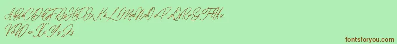 Czcionka elaineighteen – brązowe czcionki na zielonym tle