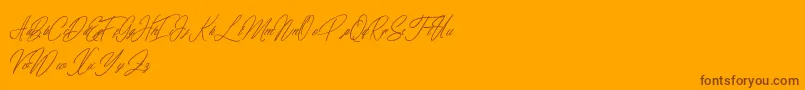 elaineighteen-Schriftart – Braune Schriften auf orangefarbenem Hintergrund