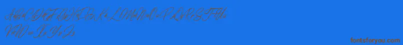 elaineighteen Font – Brown Fonts on Blue Background