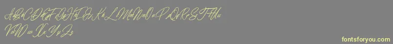 elaineighteen Font – Yellow Fonts on Gray Background