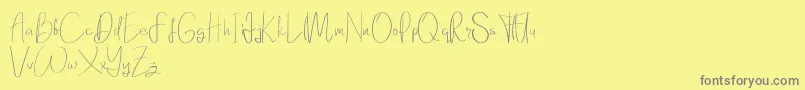 Fonte Elanor demo – fontes cinzas em um fundo amarelo