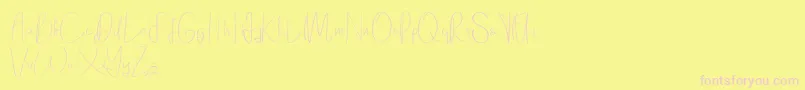 Fonte Elanor demo – fontes rosa em um fundo amarelo
