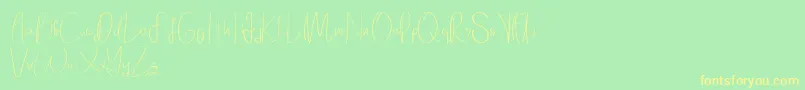 Elanor demo-Schriftart – Gelbe Schriften auf grünem Hintergrund