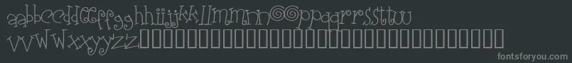 Elasw   -fontti – harmaat kirjasimet mustalla taustalla