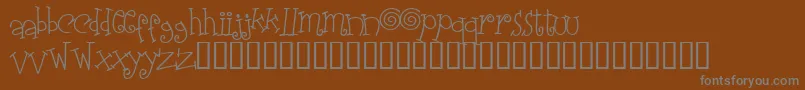 フォントElasw    – 茶色の背景に灰色の文字