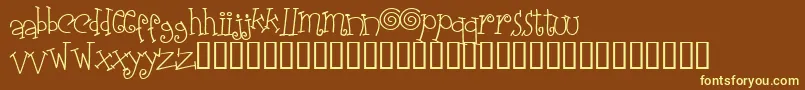 Elasw   -fontti – keltaiset fontit ruskealla taustalla