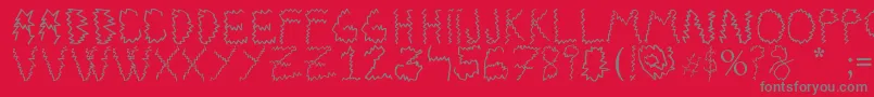 Electrica Salsa-fontti – harmaat kirjasimet punaisella taustalla