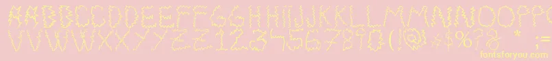 Electrica Salsa-fontti – keltaiset fontit vaaleanpunaisella taustalla