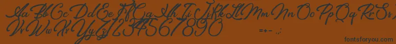 Шрифт Elegancia Romantica – чёрные шрифты на коричневом фоне