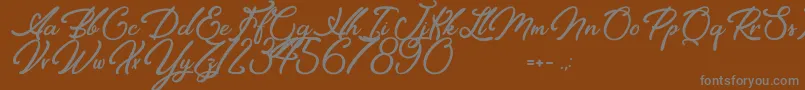 Elegancia Romantica Font – Gray Fonts on Brown Background