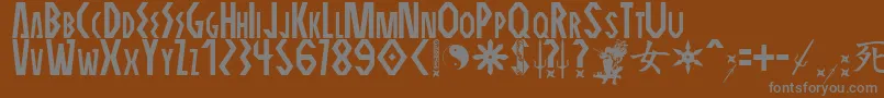 ELEKTRA ASSASSIN-fontti – harmaat kirjasimet ruskealla taustalla