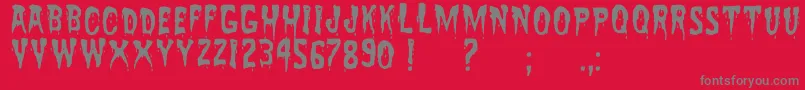 ZreaksNfi-fontti – harmaat kirjasimet punaisella taustalla
