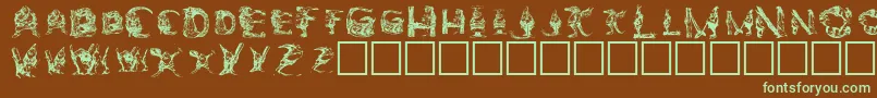 Шрифт Elfabet  Decorative – зелёные шрифты на коричневом фоне