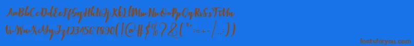 Elistabeta-Schriftart – Braune Schriften auf blauem Hintergrund