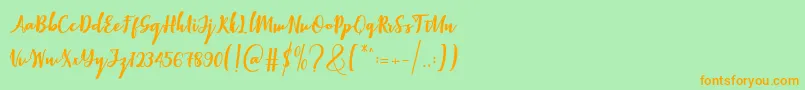 Elistabeta-Schriftart – Orangefarbene Schriften auf grünem Hintergrund