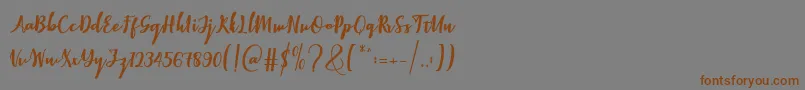 Elistabeta-Schriftart – Braune Schriften auf grauem Hintergrund