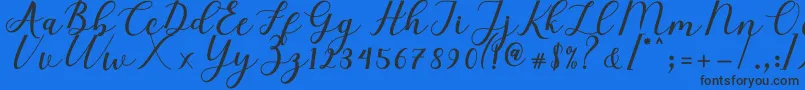 Fonte Elizabeth Script – fontes pretas em um fundo azul