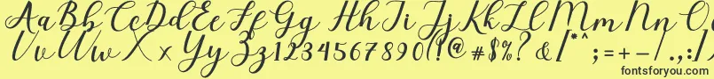 Fonte Elizabeth Script – fontes pretas em um fundo amarelo