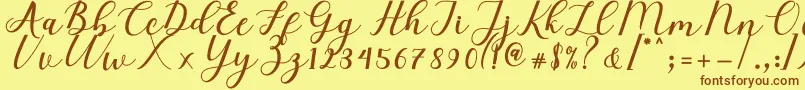 Elizabeth Script Font – Brown Fonts on Yellow Background