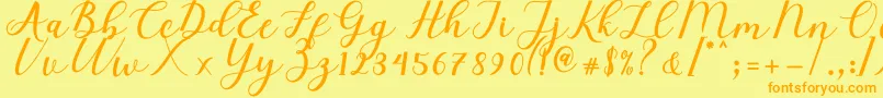 Fonte Elizabeth Script – fontes laranjas em um fundo amarelo