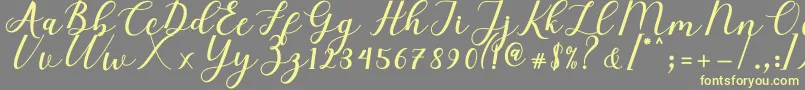 Elizabeth Script Font – Yellow Fonts on Gray Background