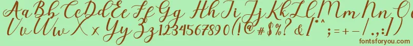 Elizabeth Script-Schriftart – Braune Schriften auf grünem Hintergrund