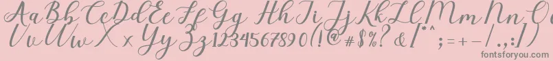 Fonte Elizabeth Script – fontes cinzas em um fundo rosa
