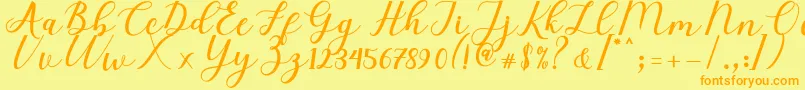 Fonte Elizabeth Script – fontes laranjas em um fundo amarelo