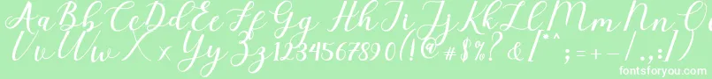 Fonte Elizabeth Script – fontes brancas em um fundo verde