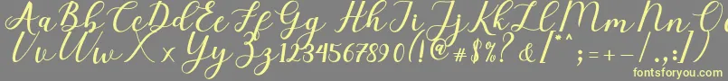 Elizabeth Script Font – Yellow Fonts on Gray Background