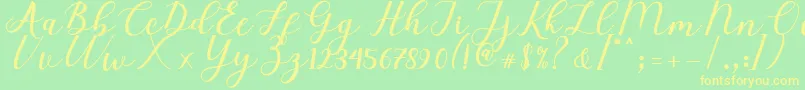 Elizabeth Script-Schriftart – Gelbe Schriften auf grünem Hintergrund