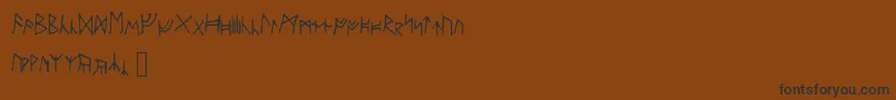 Ancientrunes-Schriftart – Schwarze Schriften auf braunem Hintergrund
