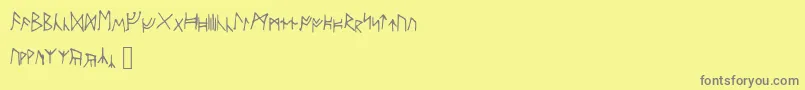 Ancientrunes-Schriftart – Graue Schriften auf gelbem Hintergrund