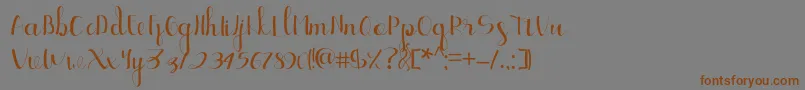Ellic Script 1-Schriftart – Braune Schriften auf grauem Hintergrund
