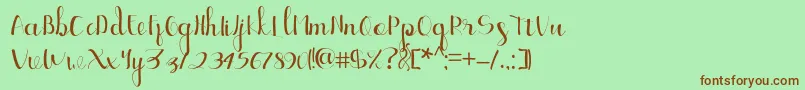 フォントEllic Script 1 – 緑の背景に茶色のフォント