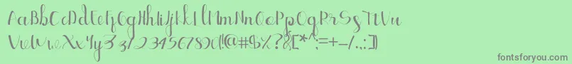 フォントEllic Script 1 – 緑の背景に灰色の文字