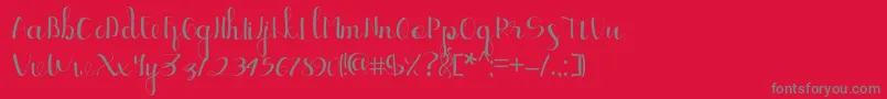 Fonte Ellic Script 1 – fontes cinzas em um fundo vermelho