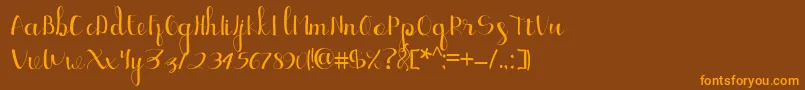 fuente Ellic Script 1 – Fuentes Naranjas Sobre Fondo Marrón