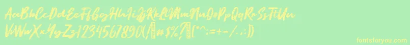 フォントEmatodas Demo – 黄色の文字が緑の背景にあります