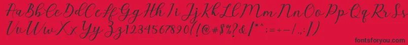 Emeley Script Font – Black Fonts on Red Background