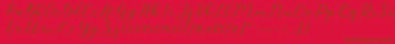 Emeley Script Font – Brown Fonts on Red Background