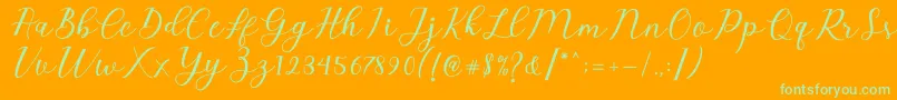 Emeley Script-Schriftart – Grüne Schriften auf orangefarbenem Hintergrund