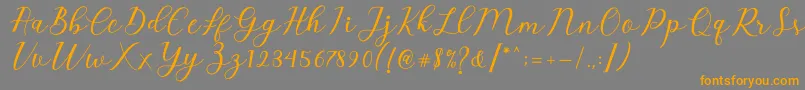 Emeley Script-Schriftart – Orangefarbene Schriften auf grauem Hintergrund