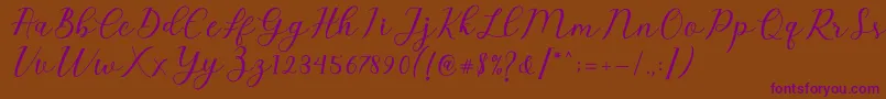 Emeley Script Font – Purple Fonts on Brown Background