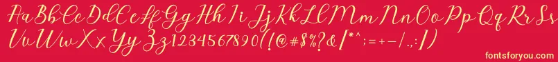 Emeley Script-Schriftart – Gelbe Schriften auf rotem Hintergrund